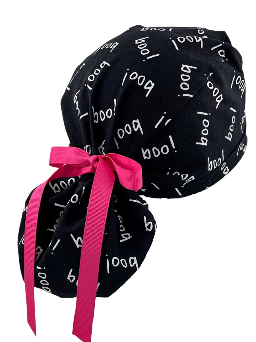 Ponytail style surgical scrub cap hat with ribbon ties.
