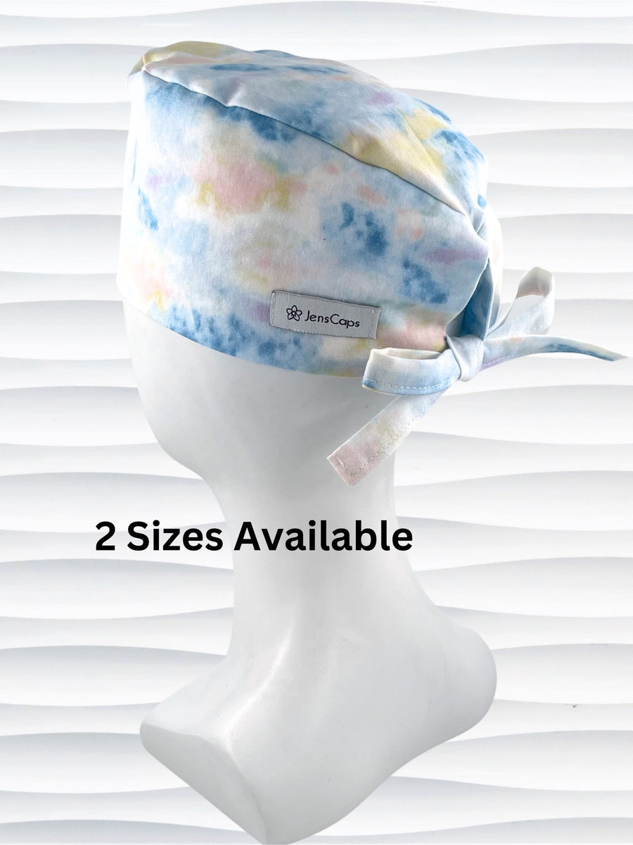 Surgeon style surgical scrub cap hat with an allover look of a sunrise in clouds on cotton fabric.
