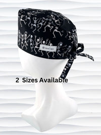 Surgeon style surgical scrub cap hat with dancing skeletons in white and gray on black cotton fabric.