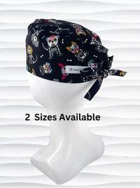 Mens surgeon style surgical scrub cap hat with sugar skull dogs in bright colors all over black cotton fabric.