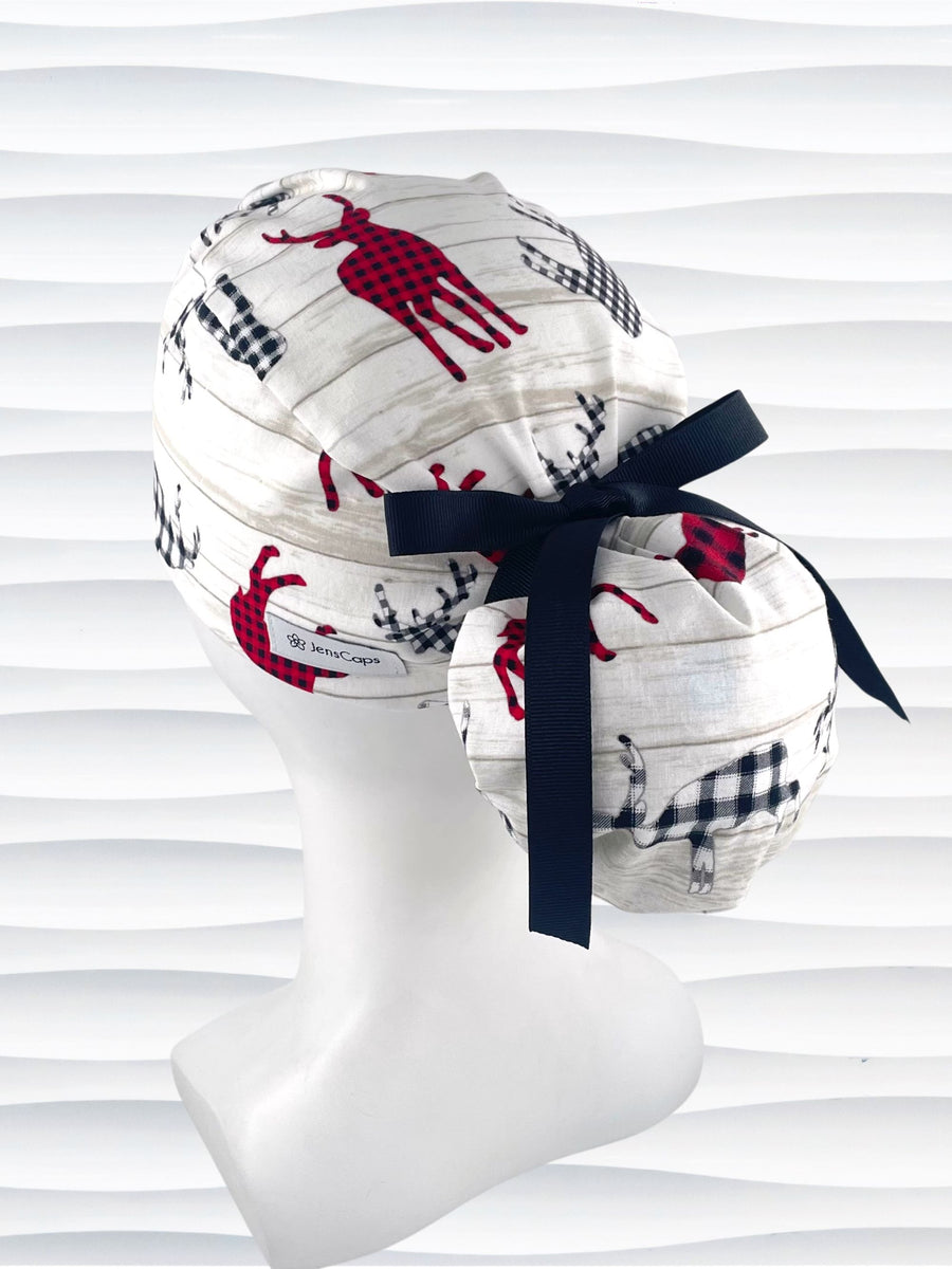 Ponytail style surgical scrub cap hat with plaid buffalo check deer on country style wood plank look cotton fabric.