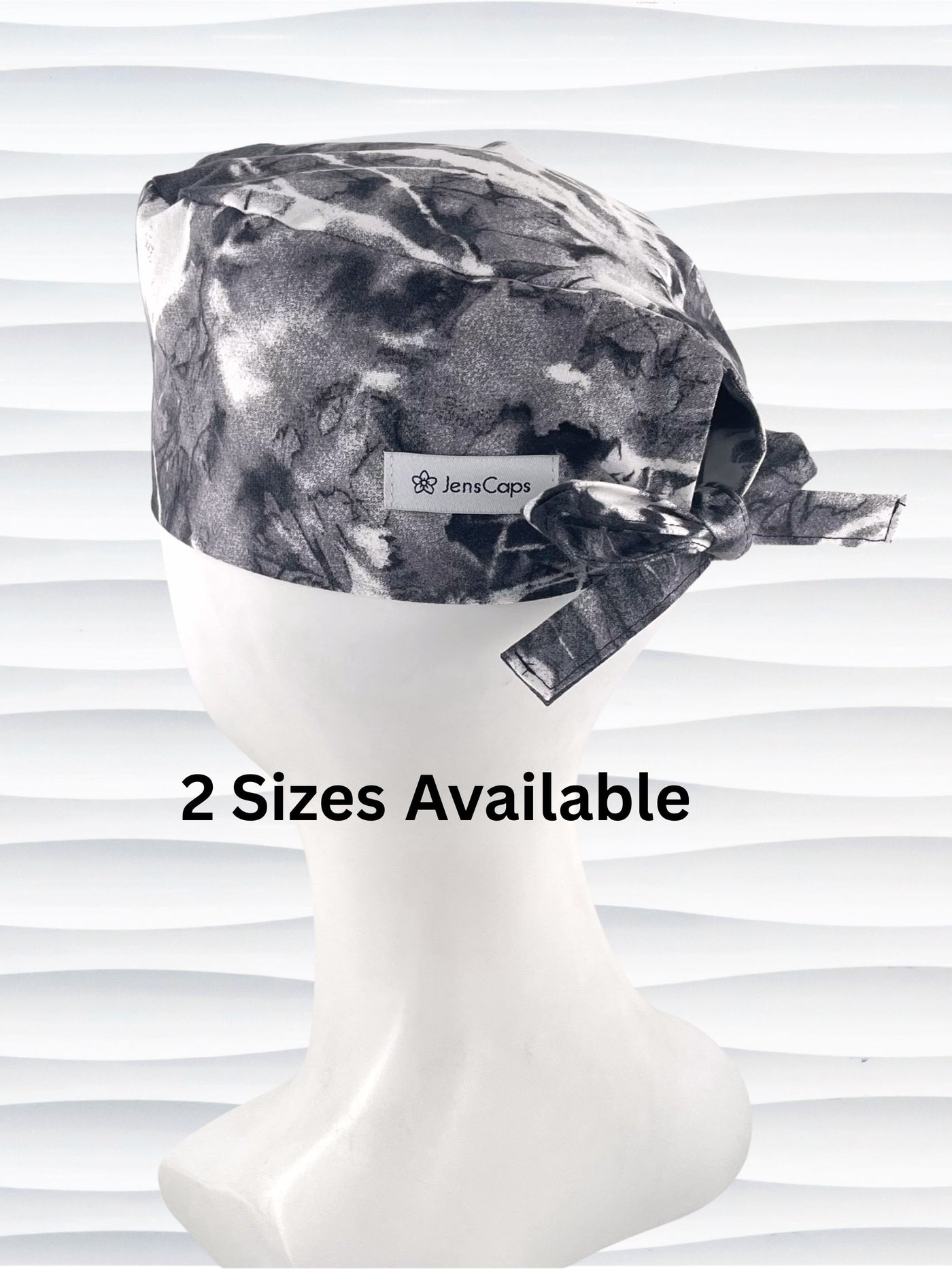 Mens surgeon style surgical scrub cap in an abstract print in black and white on cotton fabric.