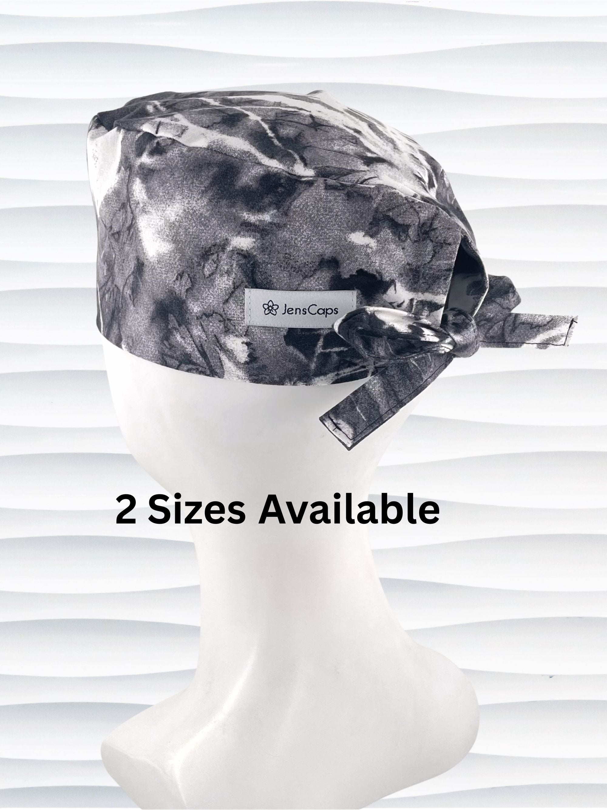 Mens surgeon style surgical scrub cap in an abstract print in black and white on cotton fabric.