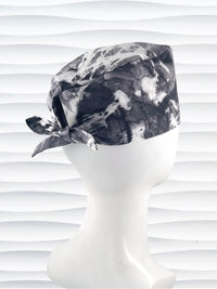 Mens surgeon style surgical scrub cap in an abstract print in black and white on cotton fabric.