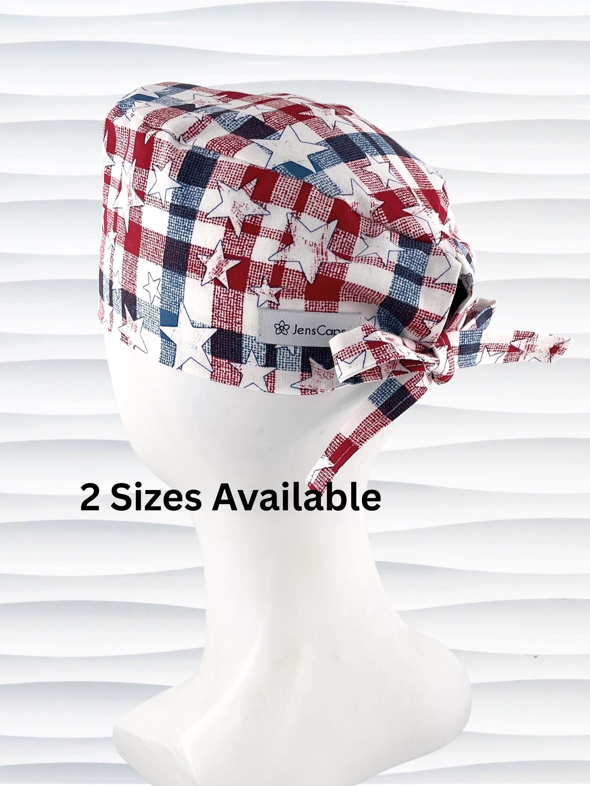 Surgeon style surgical scrub cap with a red and blue plaid print with white stars on cotton fabric.