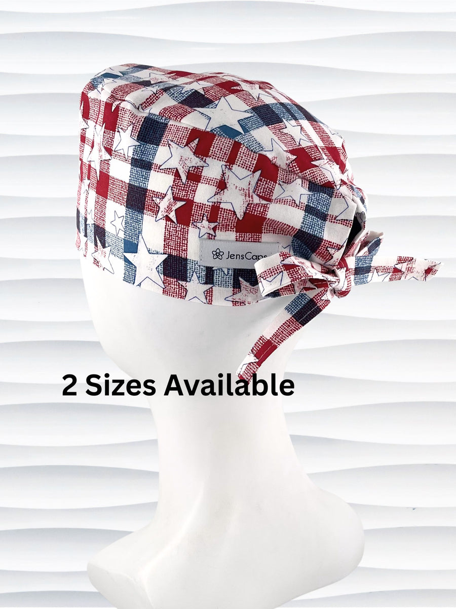 Surgeon style surgical scrub cap with a red and blue plaid print with white stars on cotton fabric.