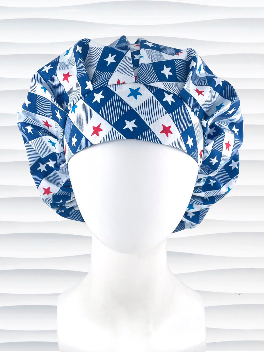 Bouffant style surgical scrub cap with patriotic stars in red white and blue in a modern blue and white buffalo plaid pattern on cotton fabric.