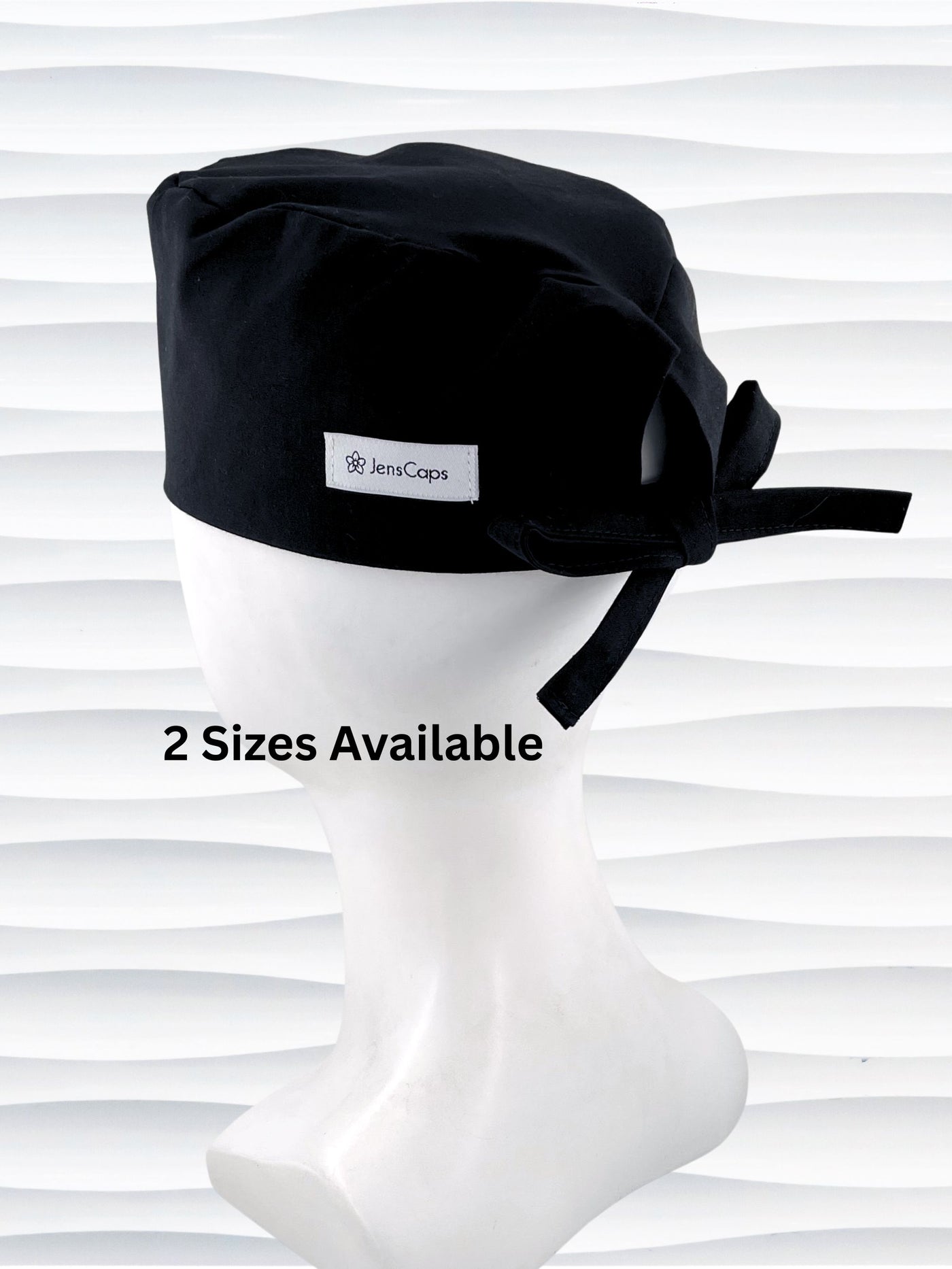 Surgeon style surgical scrub cap with solid black premium cotton and shown on white mannequin head