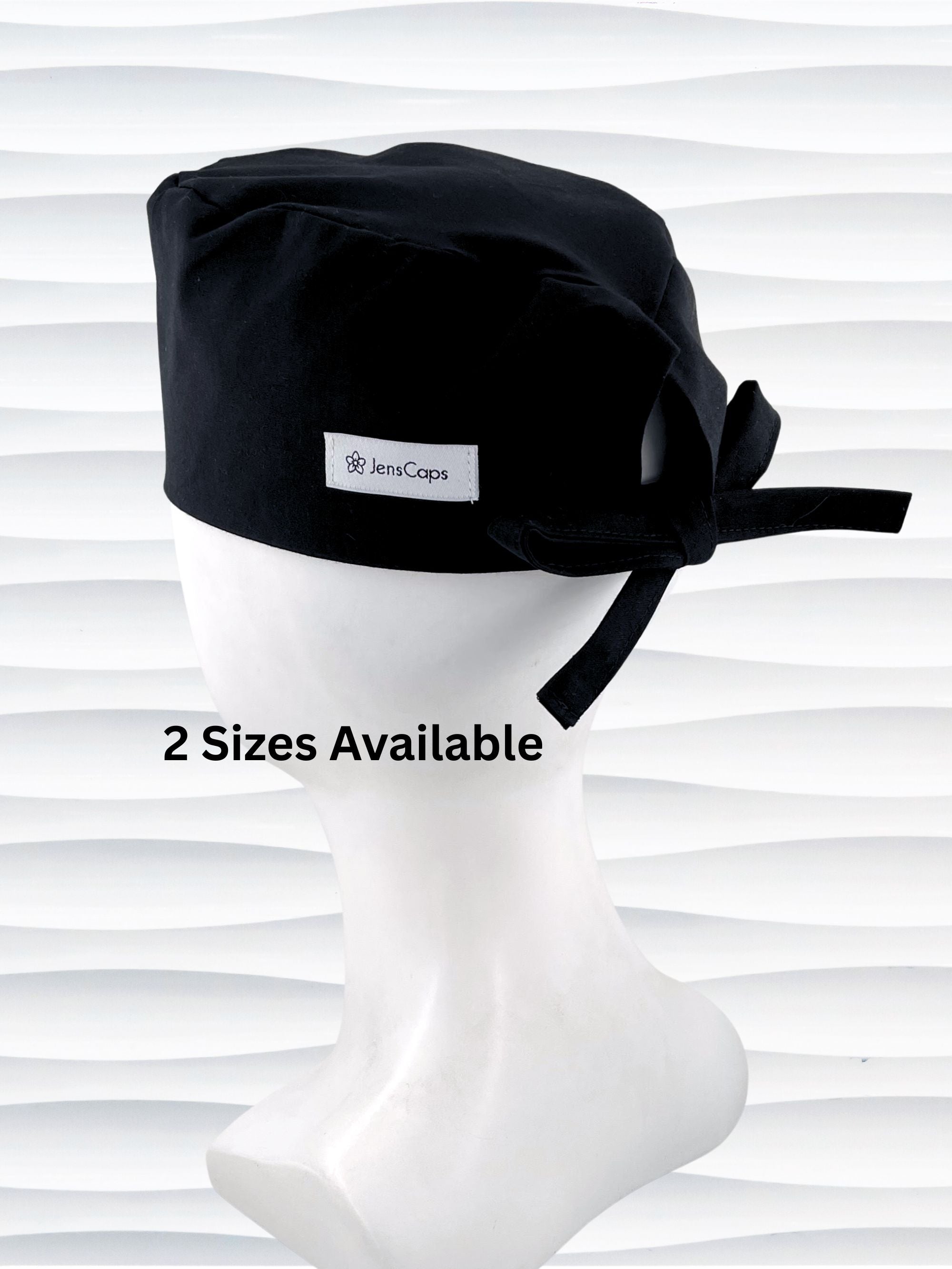 Surgeon style surgical scrub cap with solid black premium cotton and shown on white mannequin head