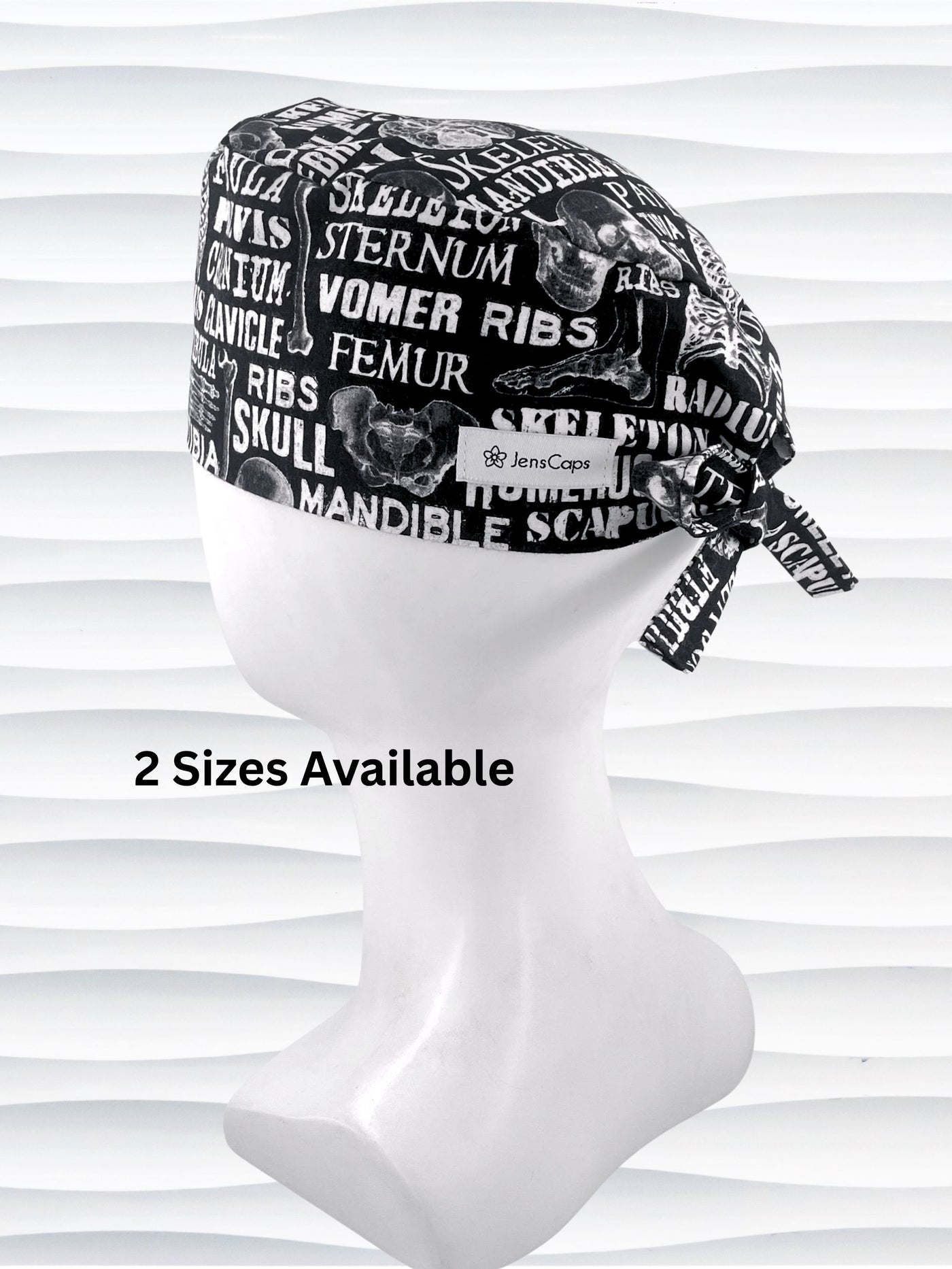 Anatomy-themed surgical scrub cap for medical professionals, featuring detailed white illustrations of the human skeleton with labeled bones like skull, mandible, and tibia on a black background