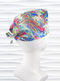 Tie-back surgical scrub cap by JensCaps with an abstract marbled swirl print in blue, magenta, yellow, and green and displayed on a white mannequin head.
