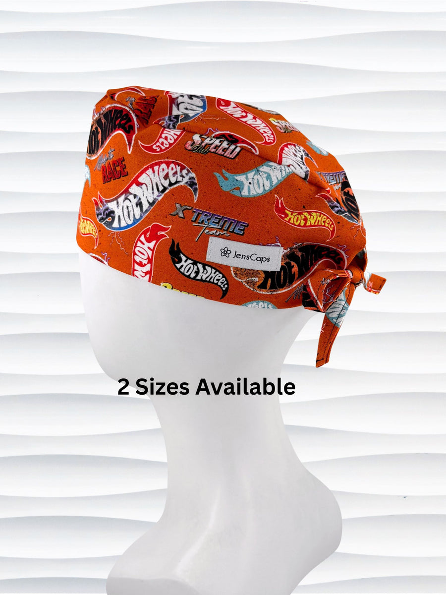 Surgeon style surgical scrub cap by JensCaps with dynamic car logos and flame details on an orange background displayed on a white mannequin head