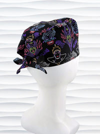 Mens style surgical scrub skull cap with neon colors of iconic villains and queens all over black cotton fabric and displayed on mannequin head.