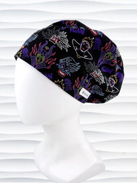 Euro Pixie style surgical scrub cap by JensCaps with neon colors of iconic villains all over black cotton fabric and displayed on mannequin head.