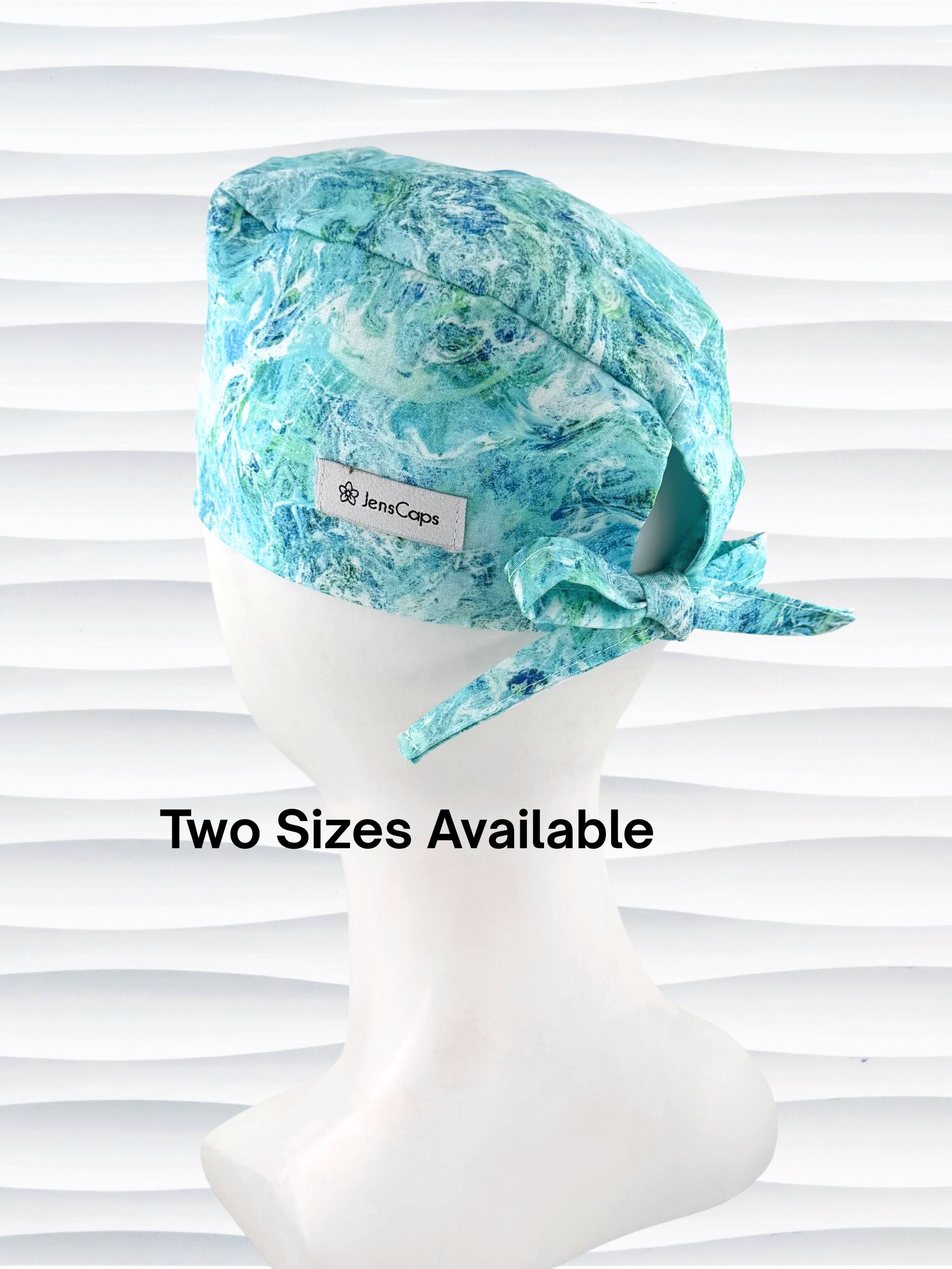 Turquoise and white marble abstract mens surgical scrub cap by JensCaps displayed on mannequin head