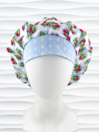 Bouffant style surgical scrub cap by JensCaps with red cherries and blue polka dots on white cotton fabric and displayed on a mannequin head.