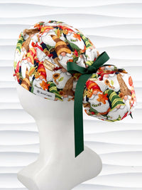 Ponytail style surgical scrub cap with gnomes in fall colors holding sunflowers and signs that say thankful, tied with a ribbon, and displayed on a mannequin head.