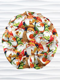 Euro Pony style surgical scrub cap with gnomes in fall colors holding sunflowers and signs that say thankful and displayed on a mannequin head.