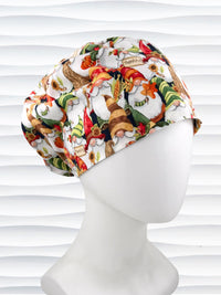 Euro Pony style surgical scrub cap with gnomes in fall colors holding sunflowers and signs that say thankful and displayed on a mannequin head.