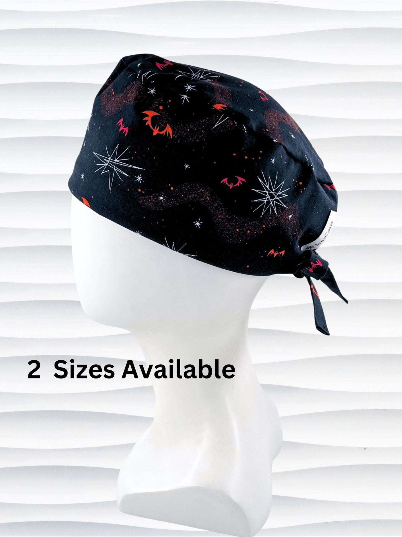 Surgeon style men's surgical scrub cap hat with red and orange bats and white stars on black cotton fabric.