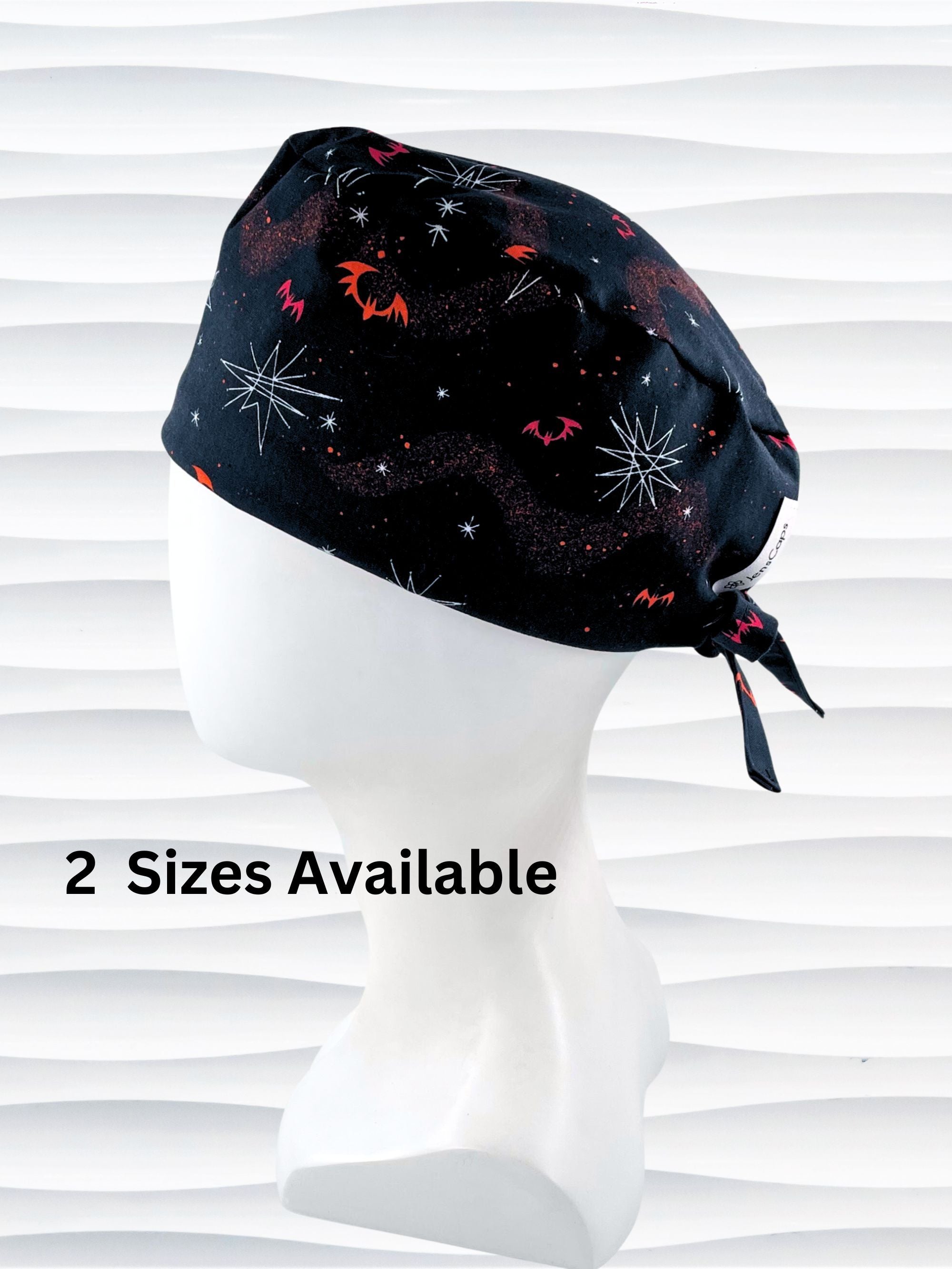 Surgeon style men's surgical scrub cap hat with red and orange bats and white stars on black cotton fabric.