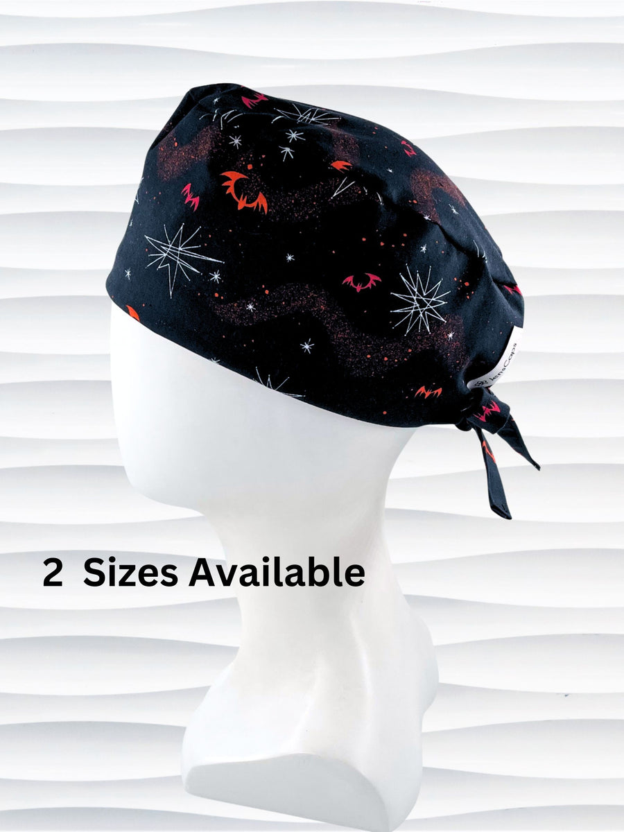 Surgeon style men's surgical scrub cap hat with red and orange bats and white stars on black cotton fabric.
