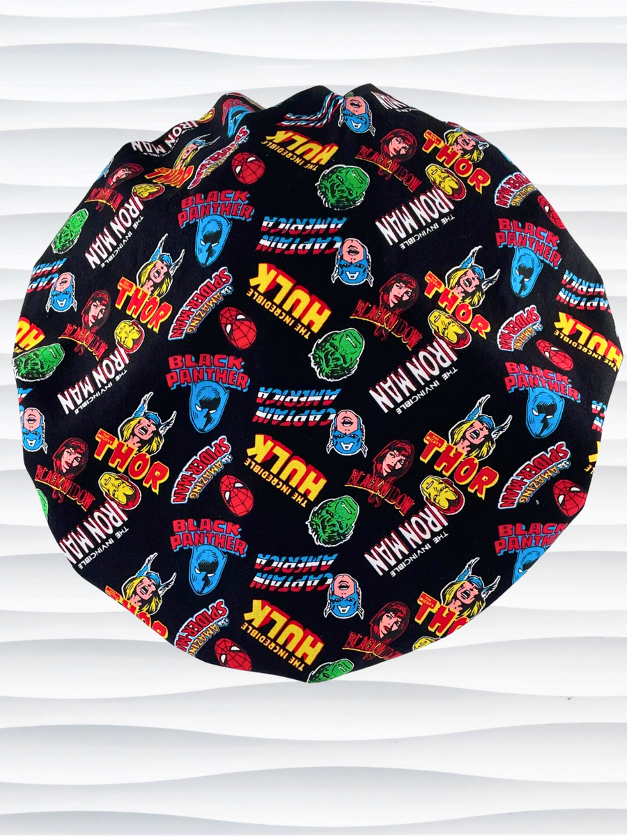 Bouffant style surgical scrub cap hat with Marvel Avengers superheroes all over this black cotton fabric.