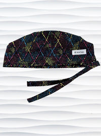 Surgeon Men's style surgical scrub cap hat with bright colored dots and lines in diamond shapes on black cotton fabric.