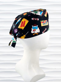 Surgeon style surgical scrub cap hat with iconic candies and Mr Owl on black cotton fabric.
