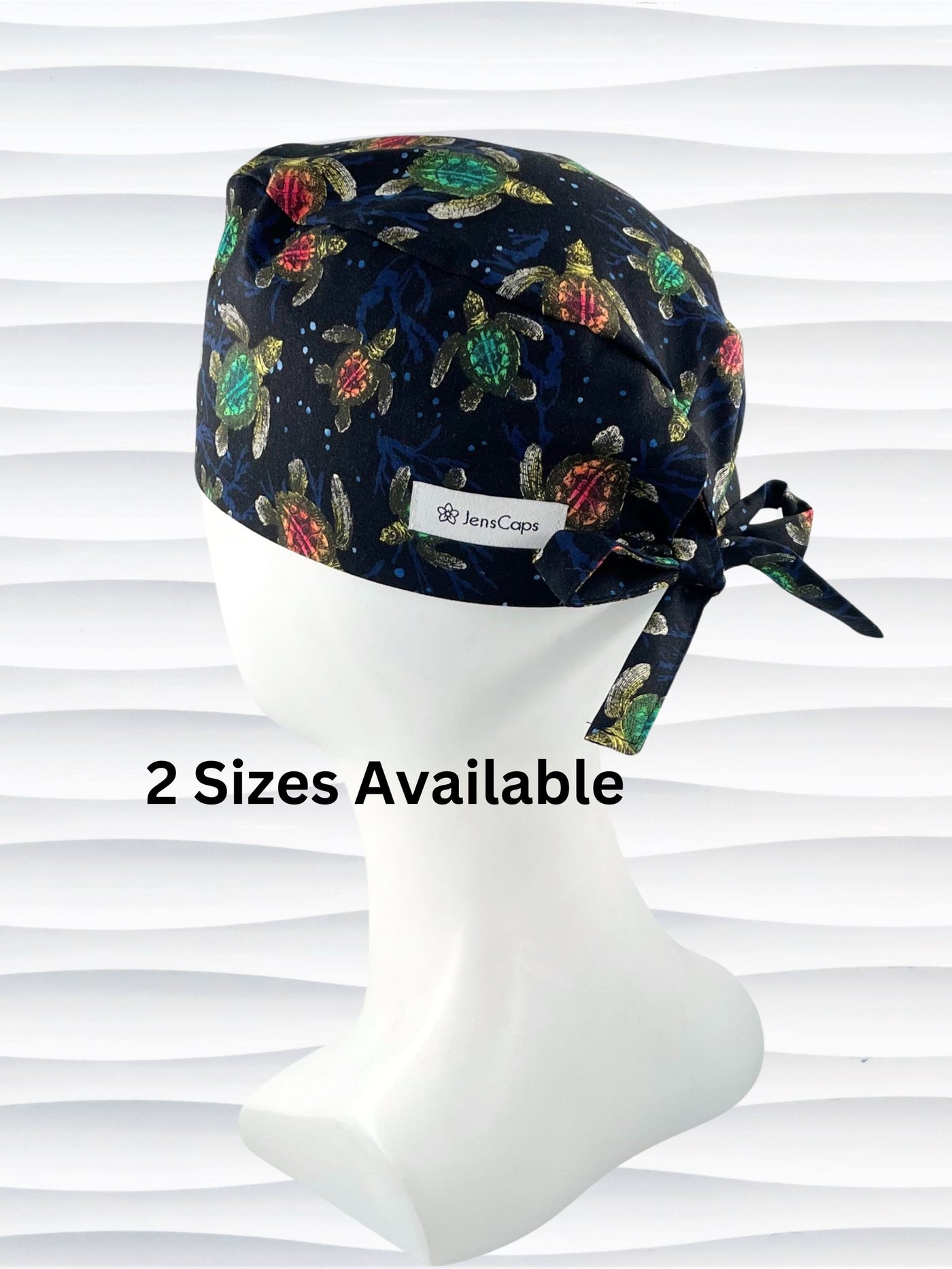 Surgeon style surgical scrub cap hat with turtles in orange and green on black cotton fabric